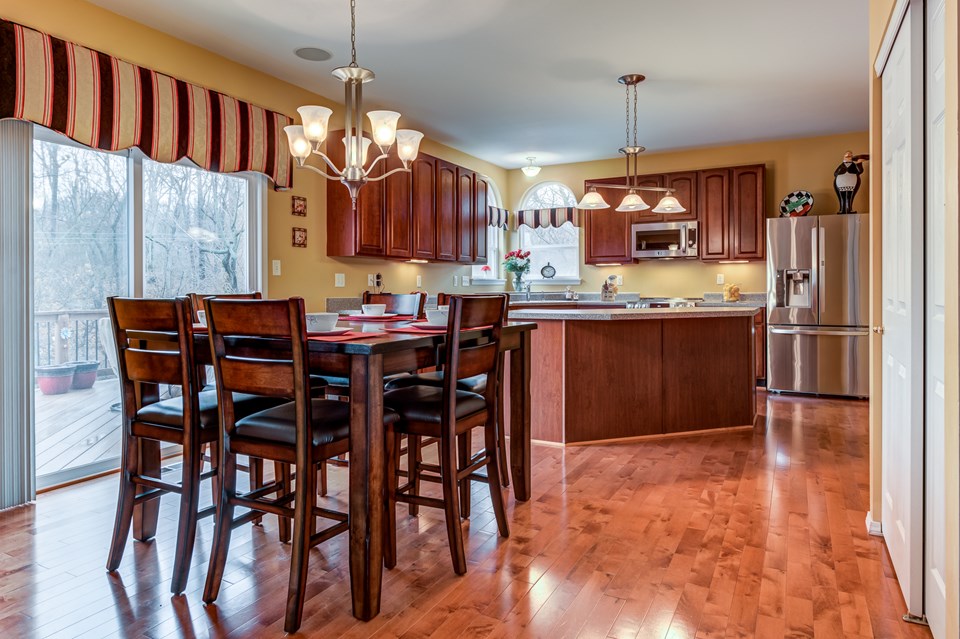 hardwood floors, dining room with a great view