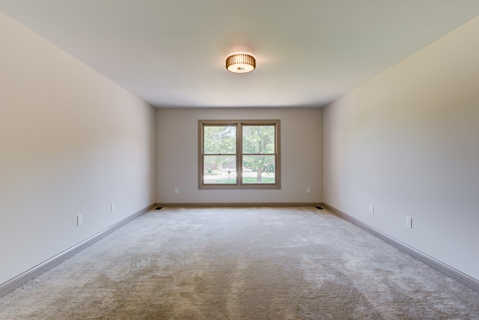 spacious 2nd bedroom-walk-in closet- attached bath & new flooring