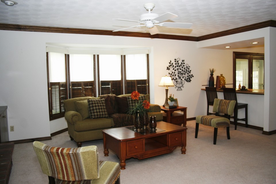 family room  breakfast bar divides family room and breakfast room.